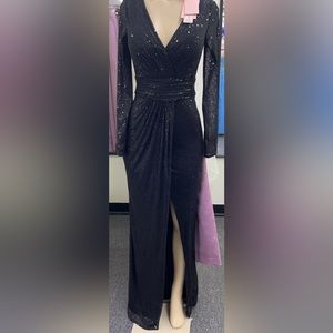 Beautiful black wrap sequin dress with split.Only whore it once.Very comfortable